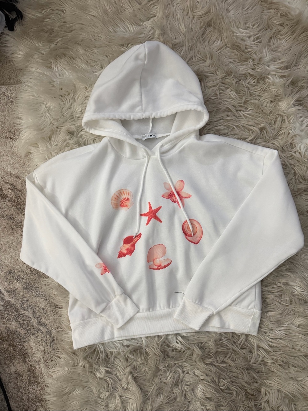 Fashion Nova Whit Hoodie with Pink Shell Motif